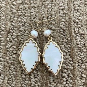 Beautiful white and gold rimmed pearl earrings
